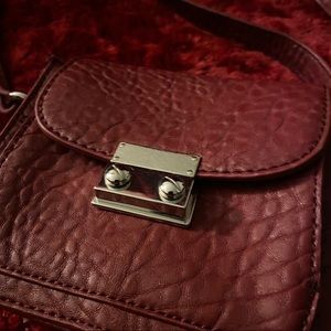 Burgundy hand bag